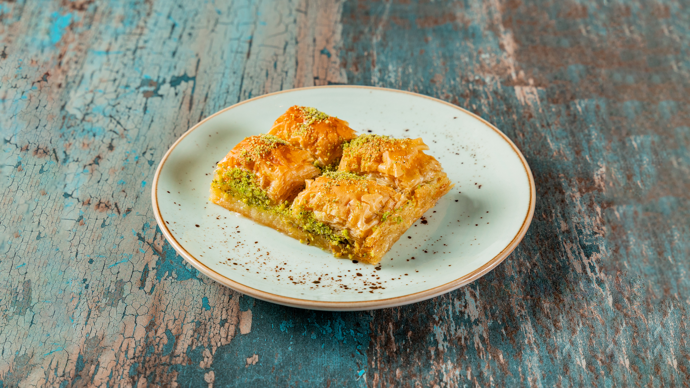 Homemade baklava with pistachio and golden syrup