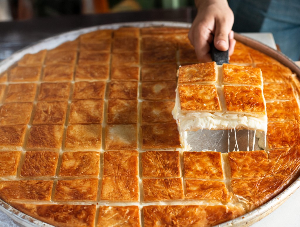 Freshly baked Levent Börek golden cheese pastries in the bakery display
